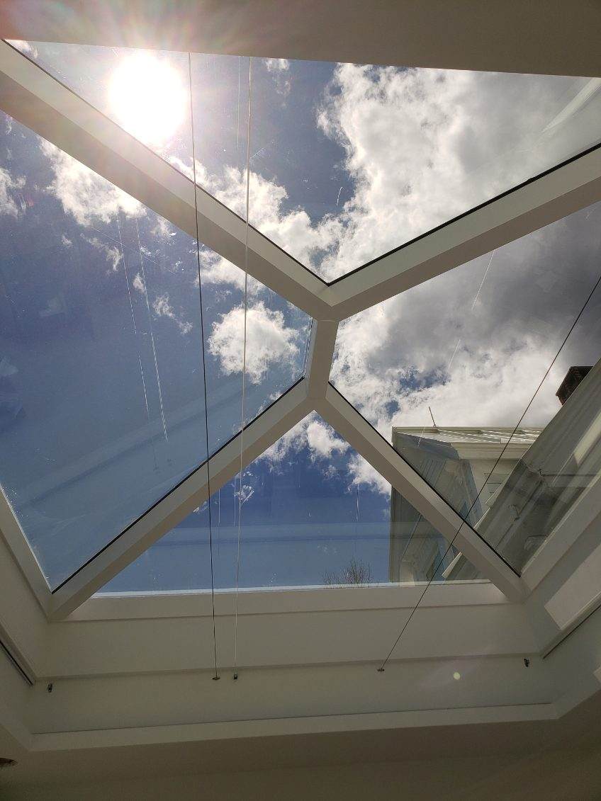 Clear skylight viewed from inside a home, restoring full natural light
