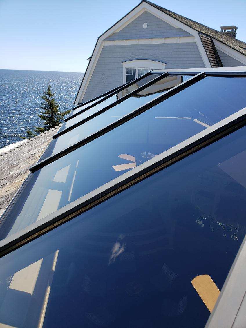 Skylight cleaned to a crystal-clear finish overlooking the coast of Maine